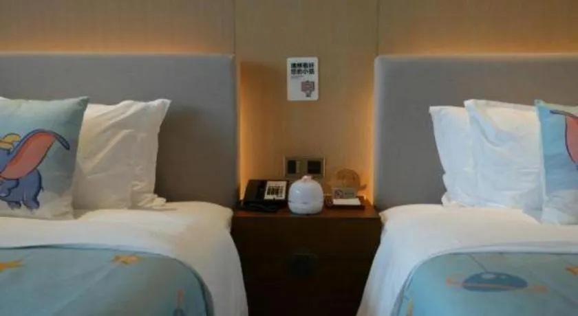 Bed in Jolie Vue Boutique Hotel Sanjiang