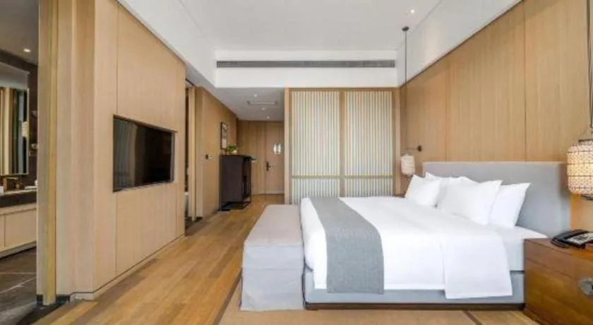 Bed in Jolie Vue Boutique Hotel Sanjiang