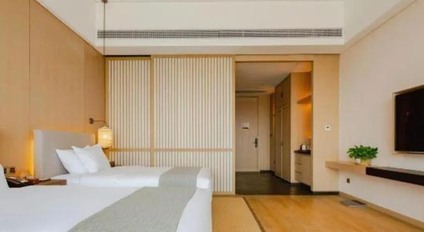 Bed in Jolie Vue Boutique Hotel Sanjiang