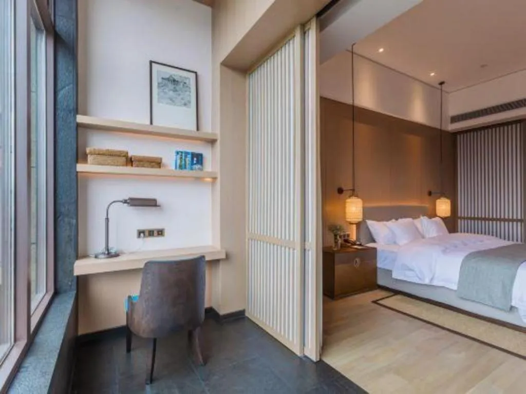 Bed in Jolie Vue Boutique Hotel Sanjiang