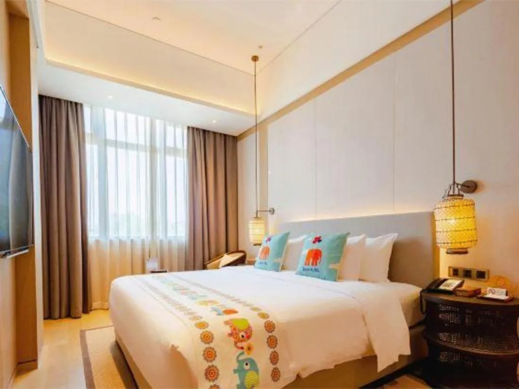 Bed in Jolie Vue Boutique Hotel Sanjiang