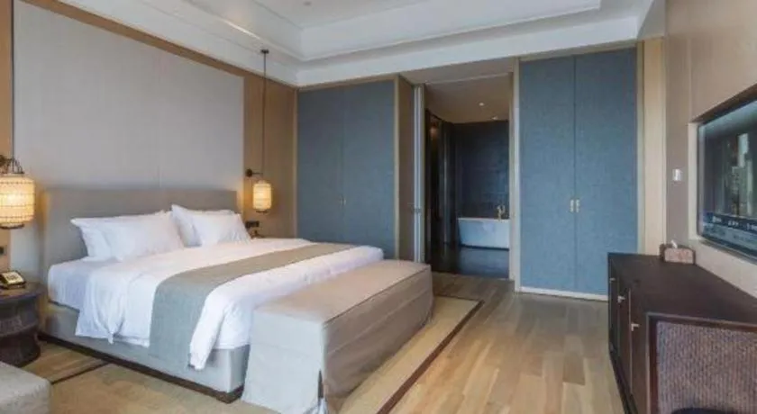 Bed in Jolie Vue Boutique Hotel Sanjiang