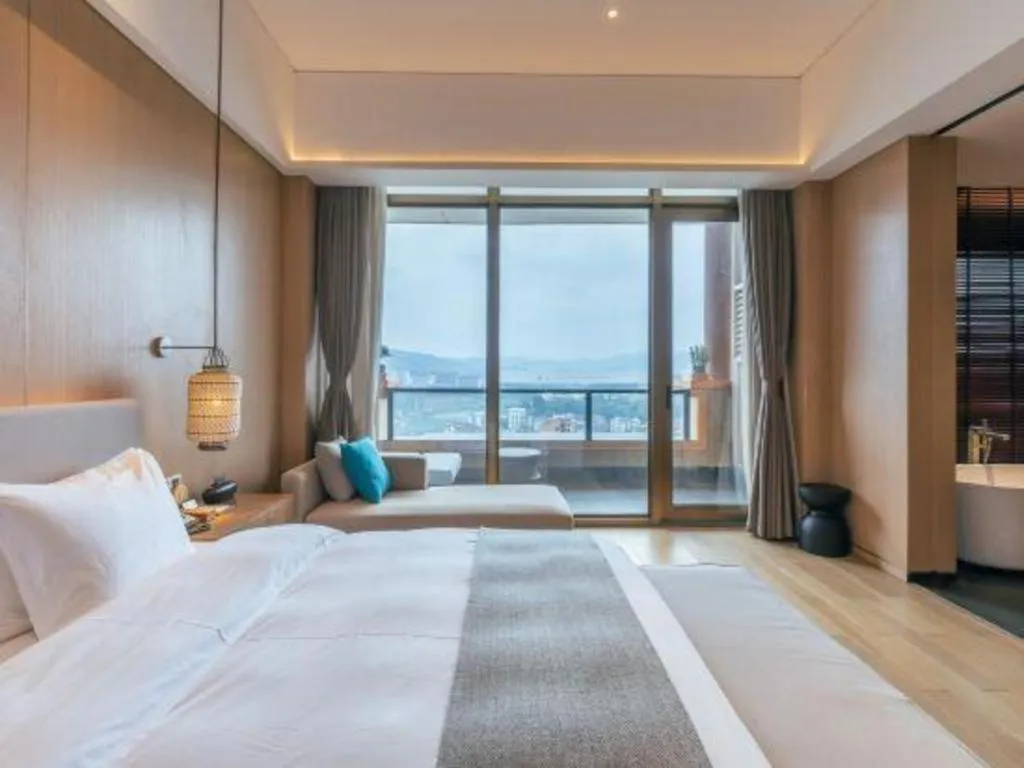Bed in Jolie Vue Boutique Hotel Sanjiang