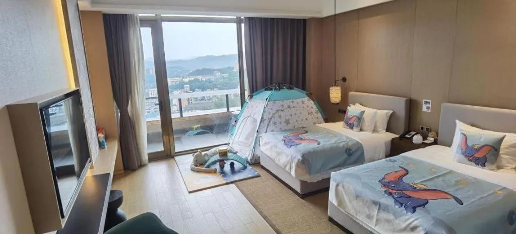 Bed in Jolie Vue Boutique Hotel Sanjiang