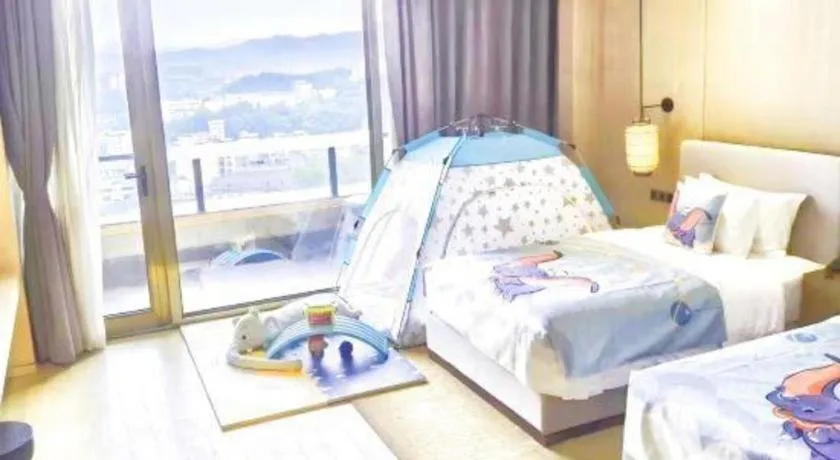 Bed in Jolie Vue Boutique Hotel Sanjiang