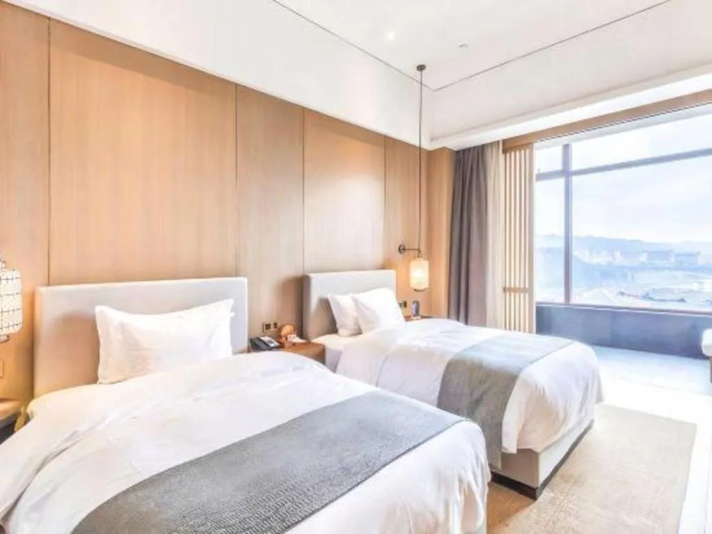 Bed in Jolie Vue Boutique Hotel Sanjiang