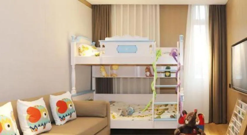 Bed in Jolie Vue Boutique Hotel Sanjiang