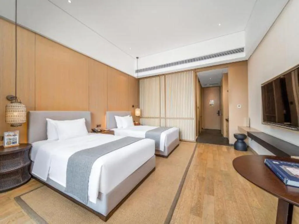 Bed in Jolie Vue Boutique Hotel Sanjiang
