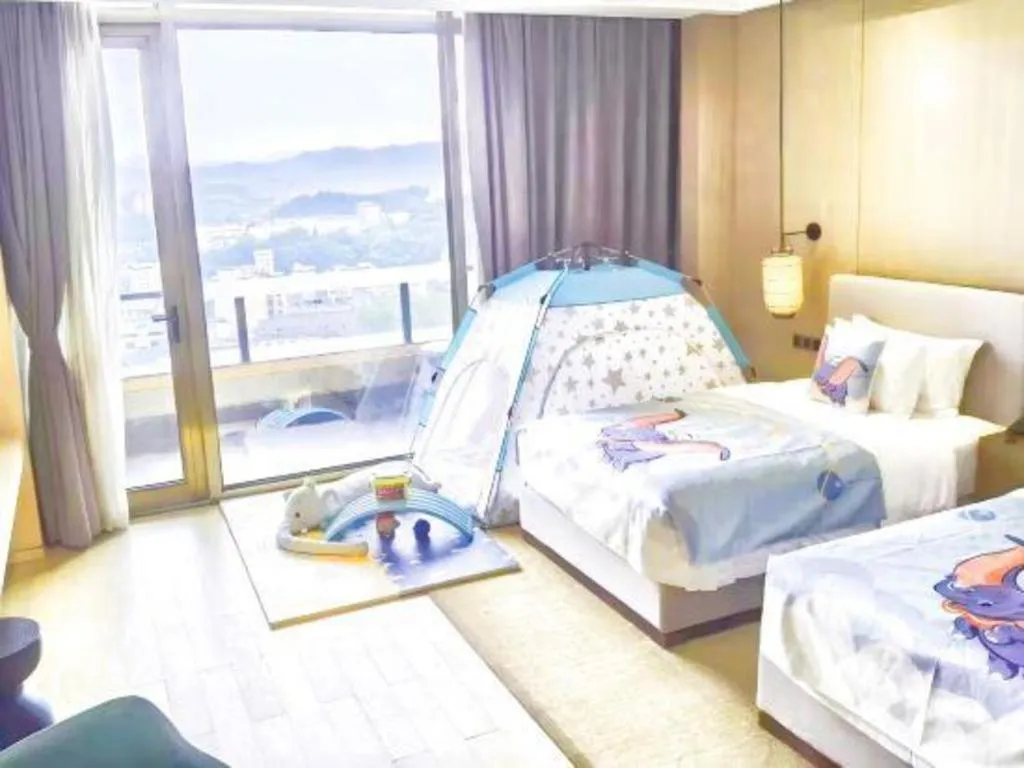 Bed in Jolie Vue Boutique Hotel Sanjiang