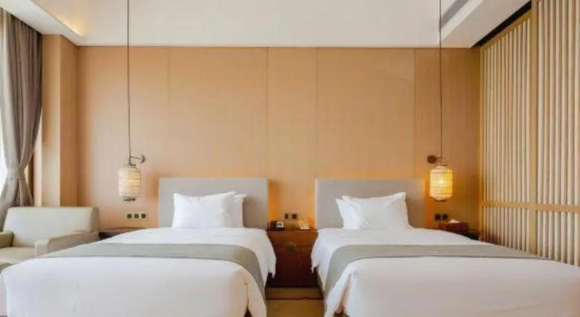 Bed in Jolie Vue Boutique Hotel Sanjiang