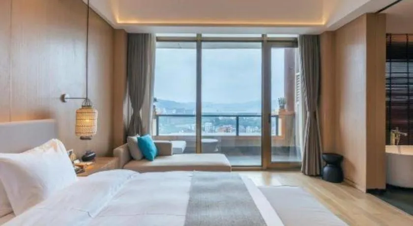 Bed in Jolie Vue Boutique Hotel Sanjiang