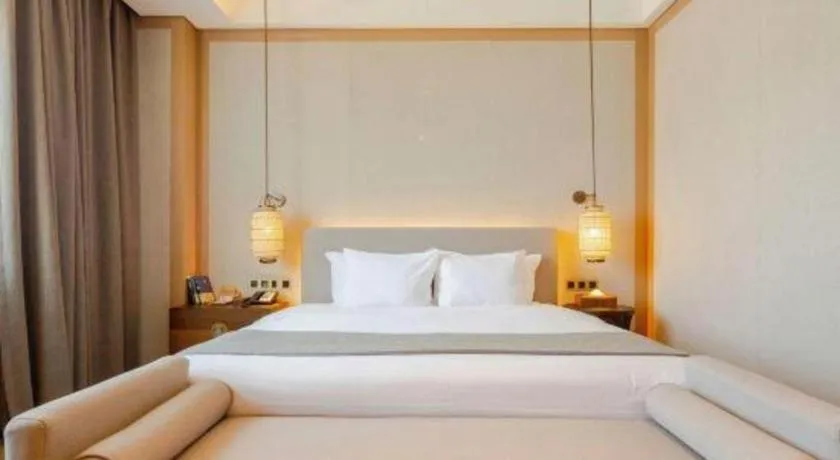 Bed in Jolie Vue Boutique Hotel Sanjiang