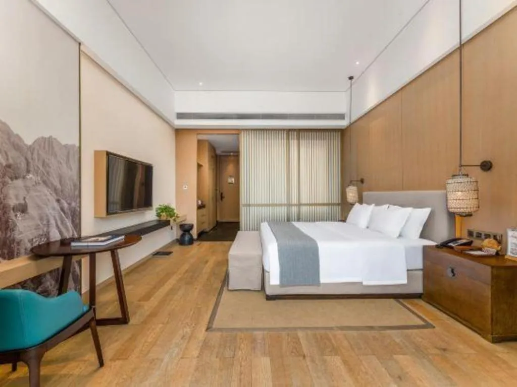 Bed in Jolie Vue Boutique Hotel Sanjiang