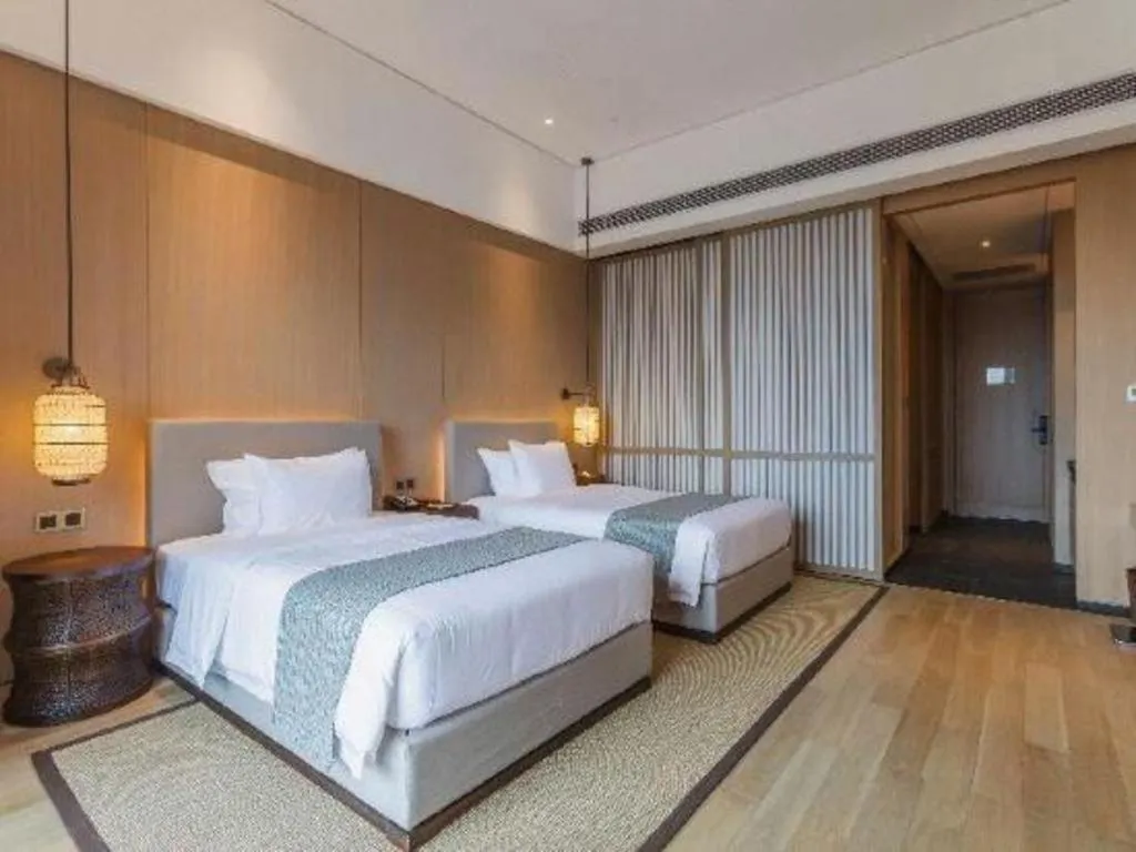 Bed in Jolie Vue Boutique Hotel Sanjiang