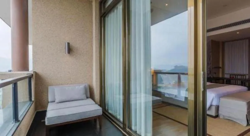 Bed in Jolie Vue Boutique Hotel Sanjiang