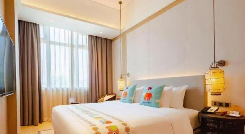 Bed in Jolie Vue Boutique Hotel Sanjiang