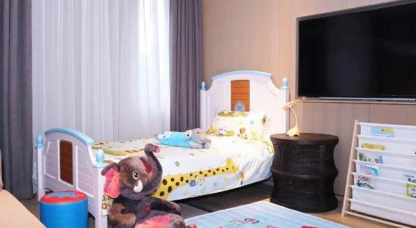 Bed in Jolie Vue Boutique Hotel Sanjiang