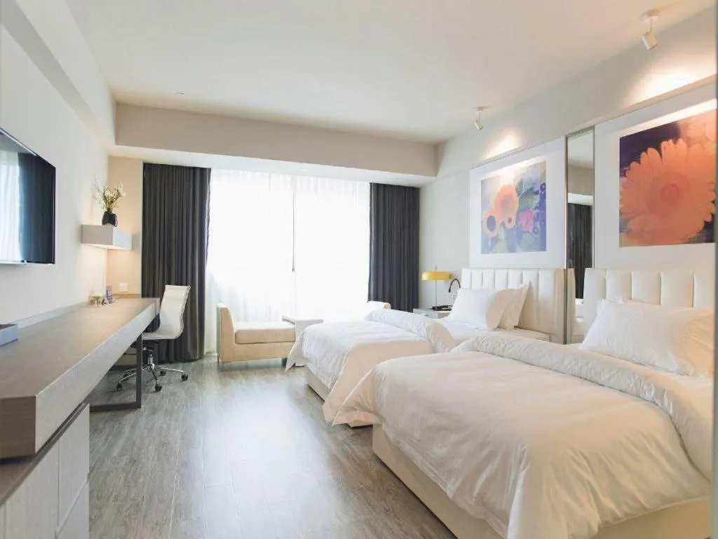 Bed in Jinjiang Metropolo Hotel - Hangzhou Xiasha