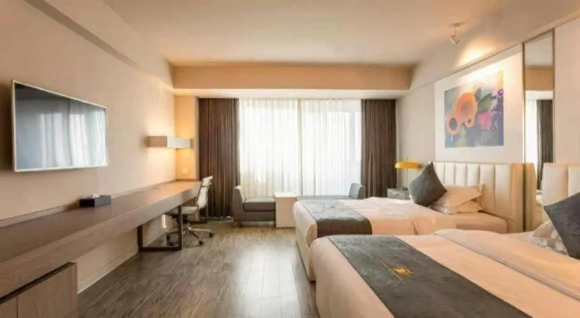 Bed in Jinjiang Metropolo Hotel - Hangzhou Xiasha