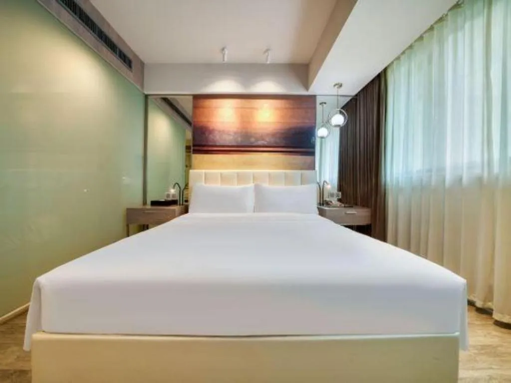 Bed in Jinjiang Metropolo Hotel - Hangzhou Xiasha
