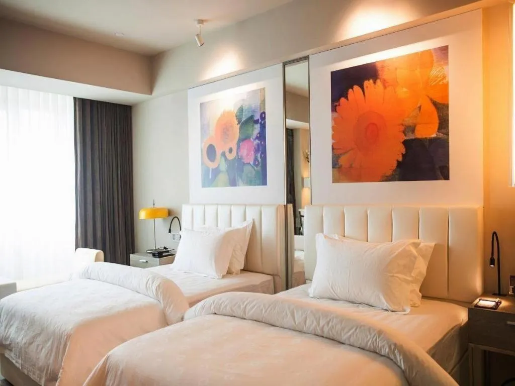 Bed in Jinjiang Metropolo Hotel - Hangzhou Xiasha