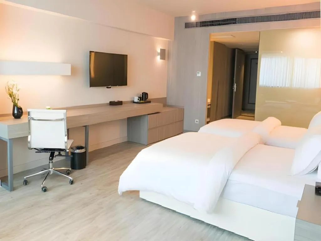 Bed in Jinjiang Metropolo Hotel - Hangzhou Xiasha