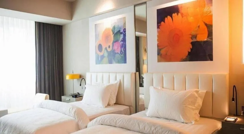 Bed in Jinjiang Metropolo Hotel - Hangzhou Xiasha