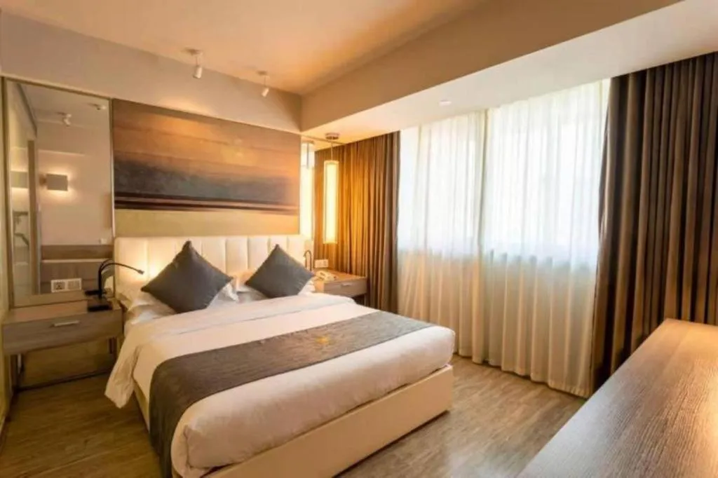 Bed in Jinjiang Metropolo Hotel - Hangzhou Xiasha