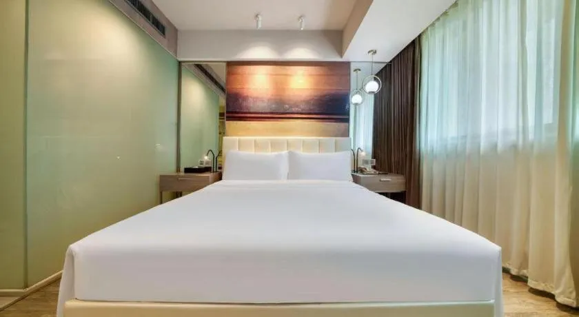 Bed in Jinjiang Metropolo Hotel - Hangzhou Xiasha
