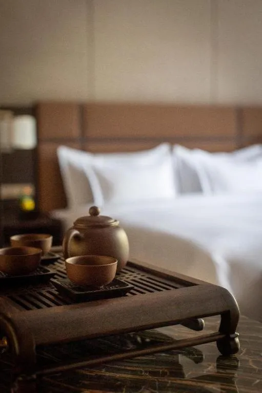 Bed in Fortune Grove Hotel Beijing