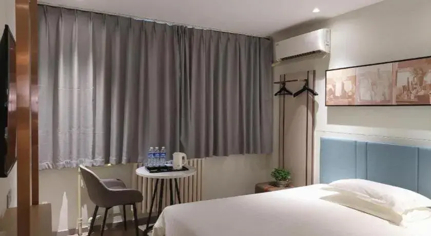 Bed in Jinjiang Inn Zibo People's Park Liuquan Road Bed in Jinjiang Inn Zibo People's Park Liuquan Road