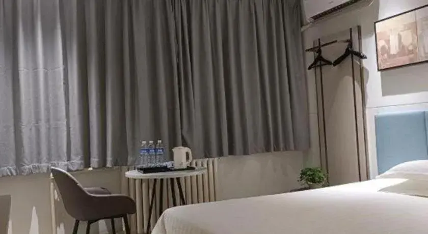 Bed in Jinjiang Inn Zibo People's Park Liuquan Road Bed in Jinjiang Inn Zibo People's Park Liuquan Road