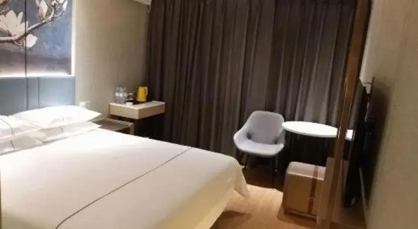 Bed in Jinjiang Inn Zibo People's Park Liuquan Road Bed in Jinjiang Inn Zibo People's Park Liuquan Road