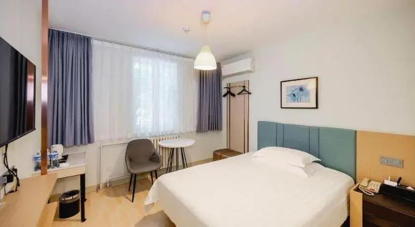 Bed in Jinjiang Inn Zibo People's Park Liuquan Road Bed in Jinjiang Inn Zibo People's Park Liuquan Road