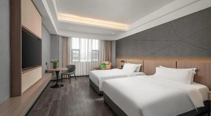 Bed in ibis Styles Dongguan Chang-an Wanda Plaza Hotel