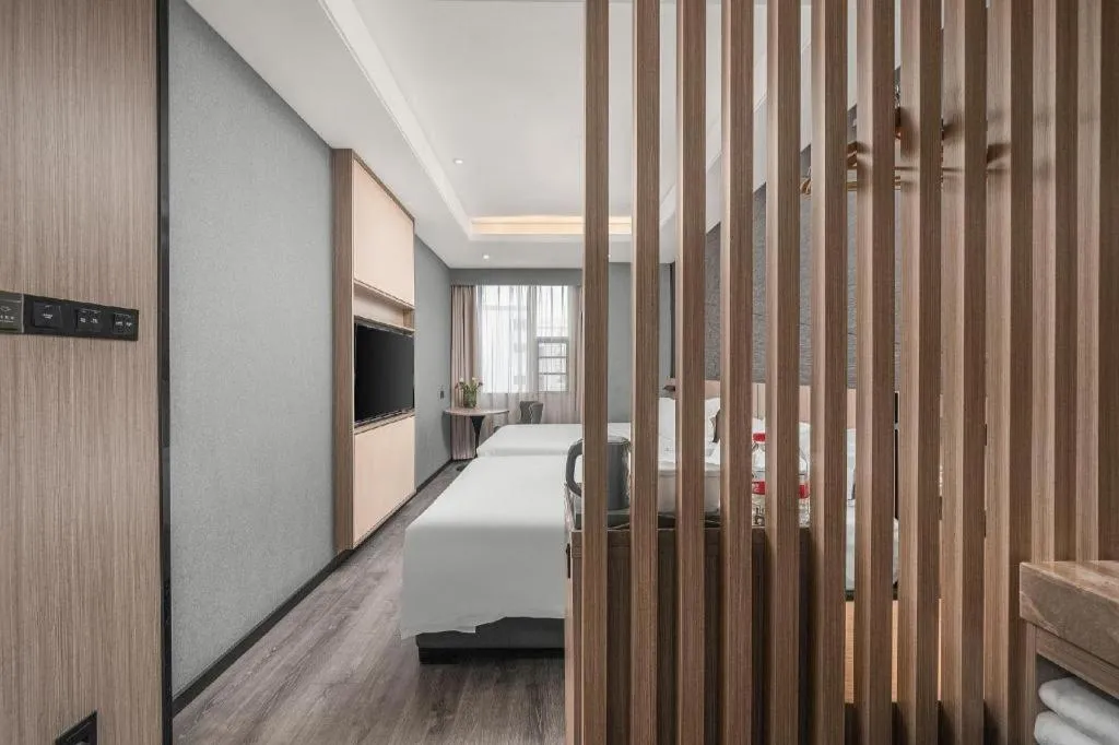 Bed in ibis Styles Dongguan Chang-an Wanda Plaza Hotel