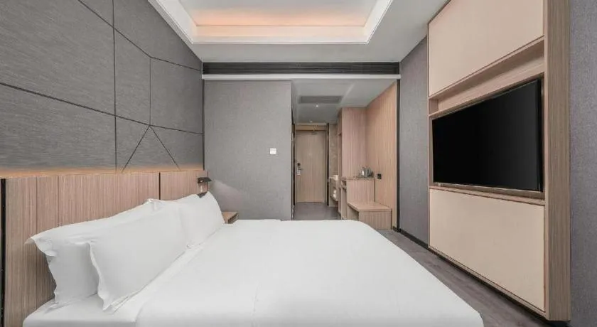 Bed in ibis Styles Dongguan Chang-an Wanda Plaza Hotel