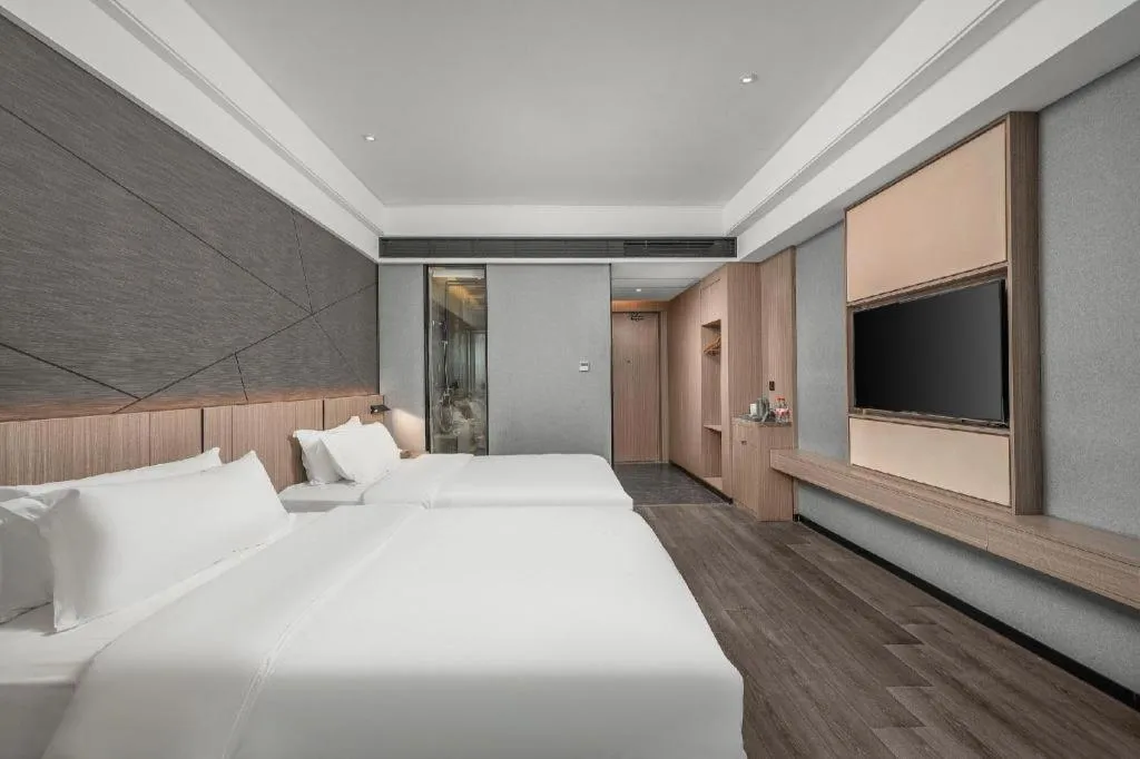 Bed in ibis Styles Dongguan Chang-an Wanda Plaza Hotel