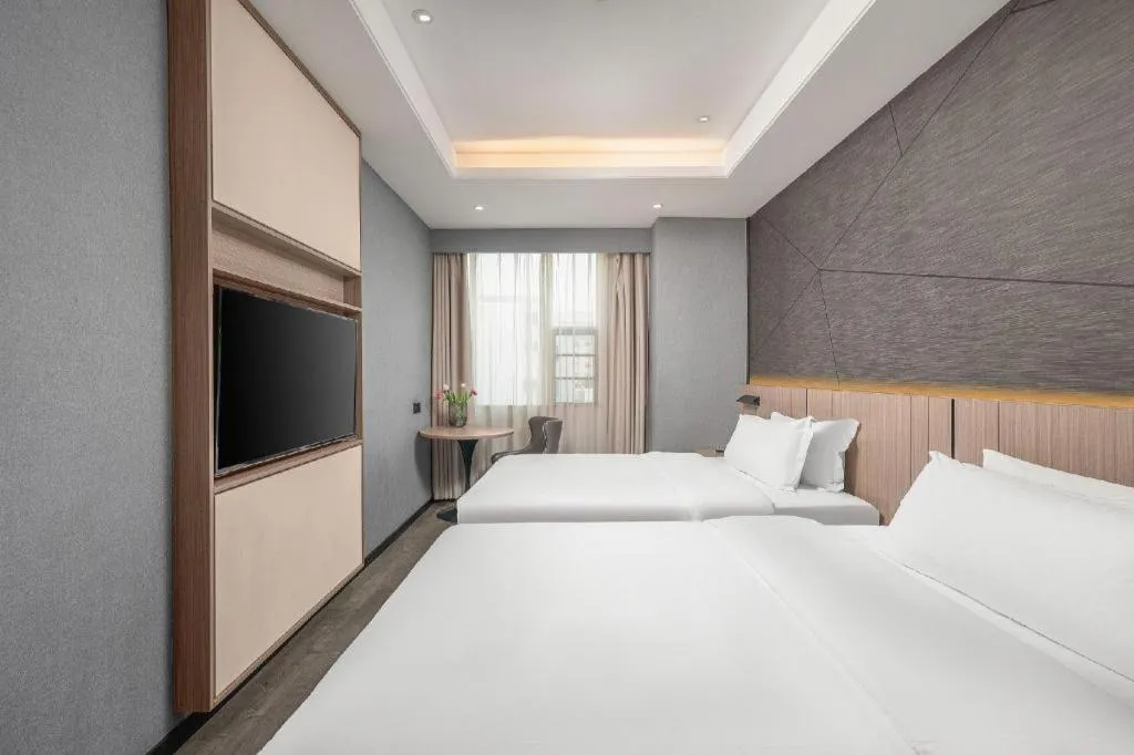Bed in ibis Styles Dongguan Chang-an Wanda Plaza Hotel