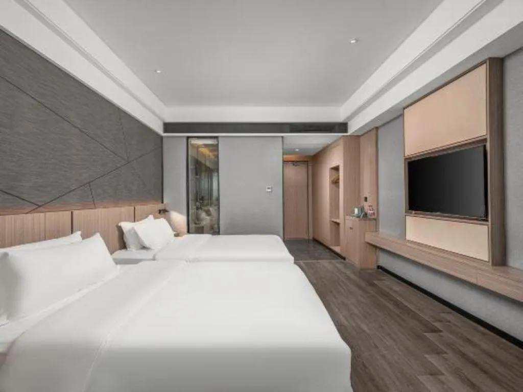 Bed in ibis Styles Dongguan Chang-an Wanda Plaza Hotel