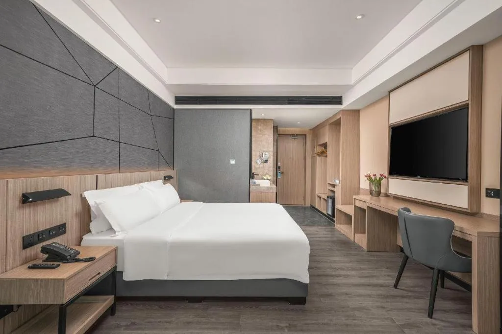 Bed in ibis Styles Dongguan Chang-an Wanda Plaza Hotel