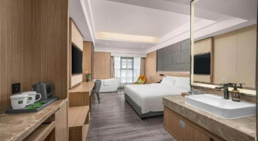 Bed in ibis Styles Dongguan Chang-an Wanda Plaza Hotel