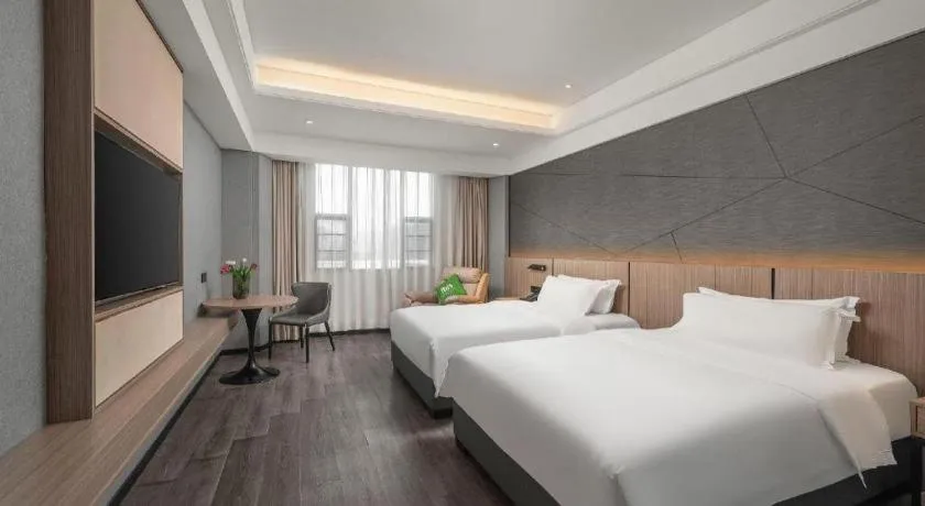 Bed in ibis Styles Dongguan Chang-an Wanda Plaza Hotel