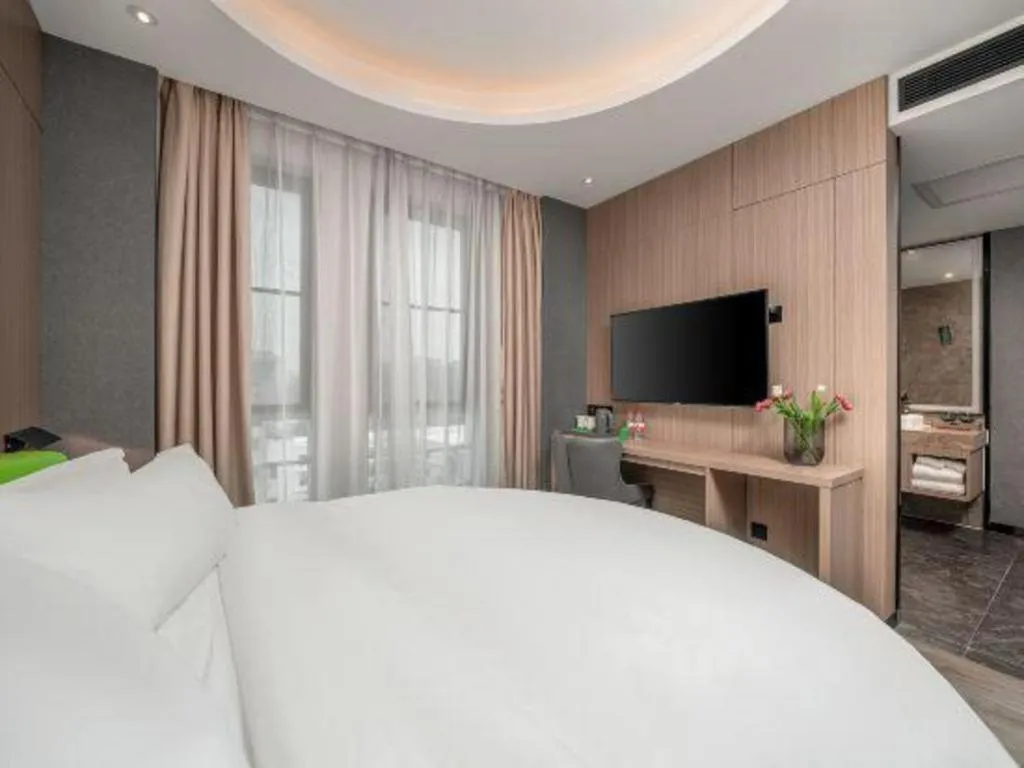 Bed in ibis Styles Dongguan Chang-an Wanda Plaza Hotel