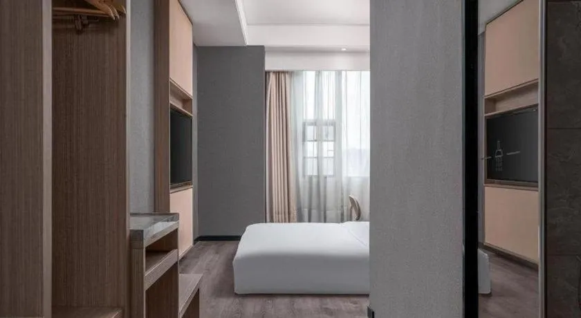 Bed in ibis Styles Dongguan Chang-an Wanda Plaza Hotel
