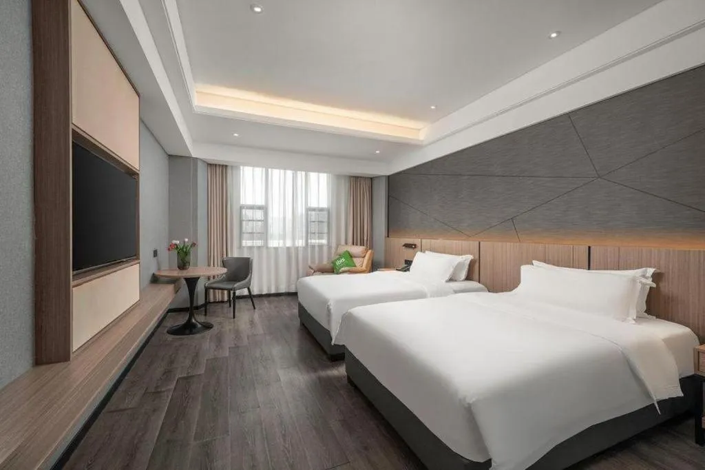Bed in ibis Styles Dongguan Chang-an Wanda Plaza Hotel