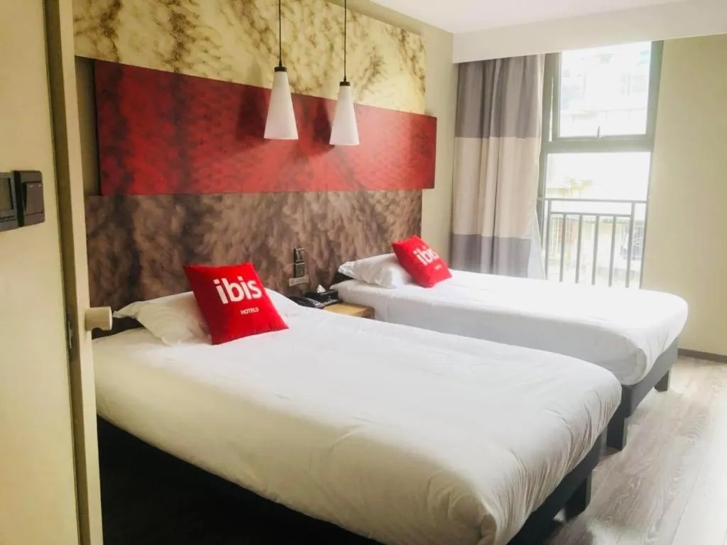 Bed in ibis Chengdu East Railway Station Hotel