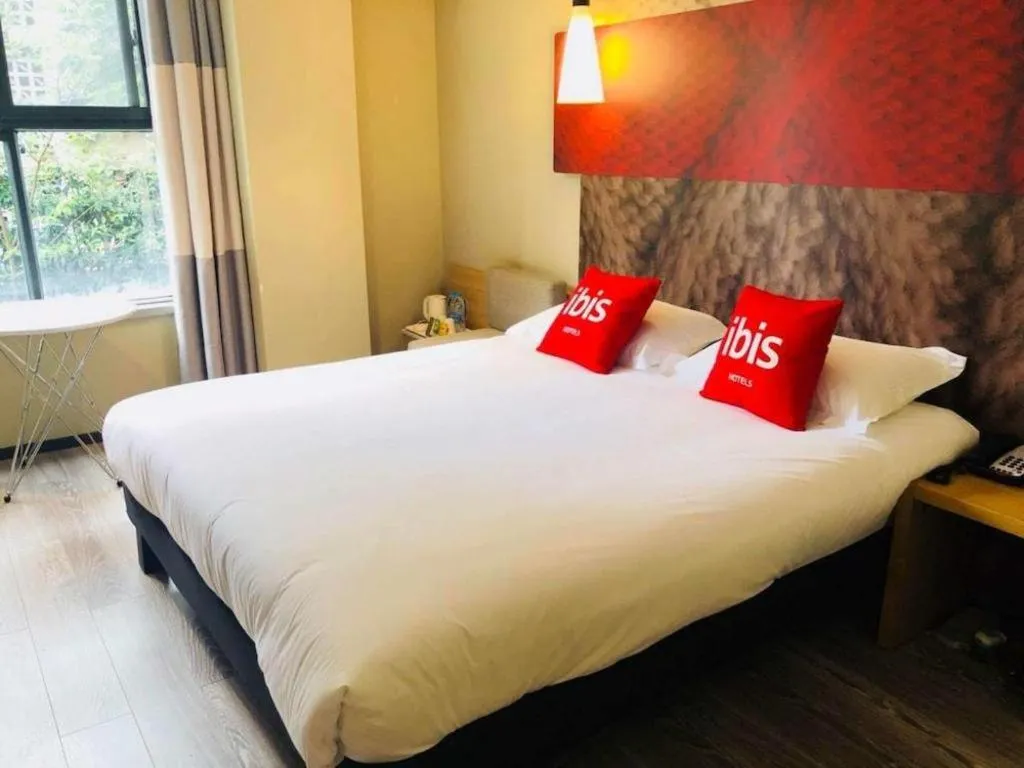 Bed in ibis Chengdu East Railway Station Hotel