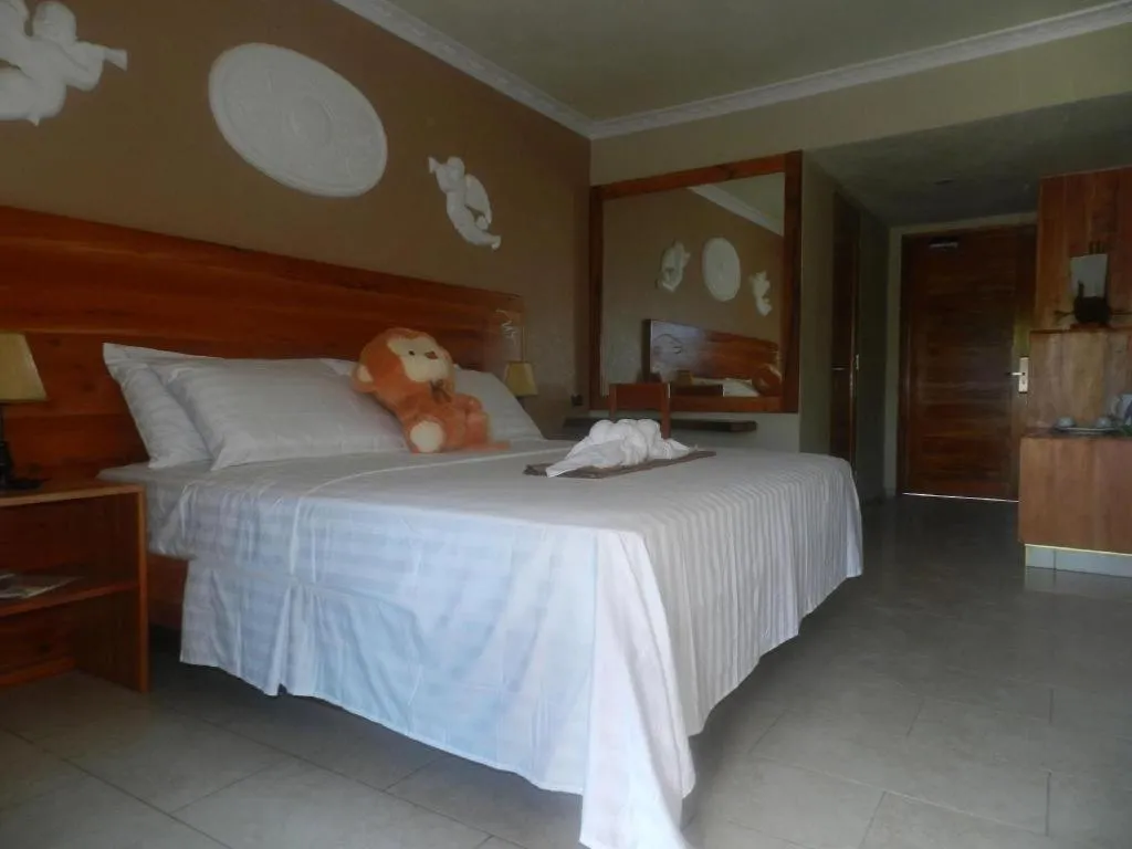 Bed in Roman Empire Panglao Boutique Resort