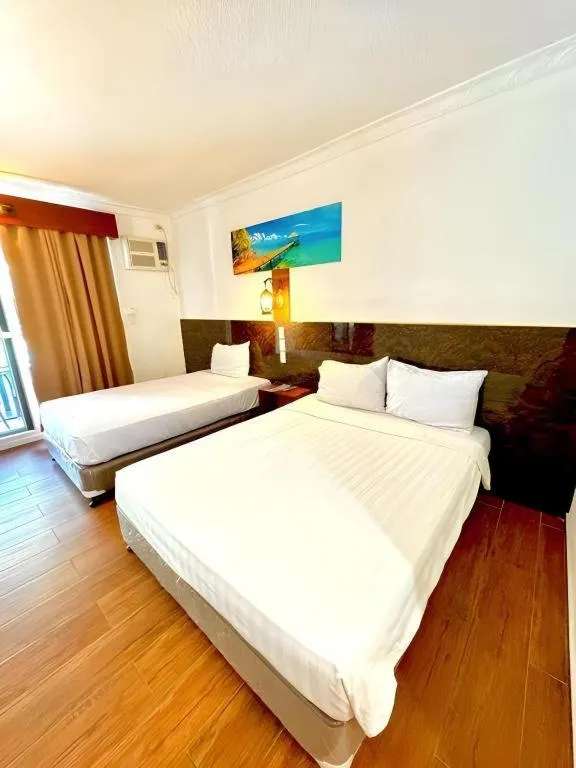 Bed in Roman Empire Panglao Boutique Resort